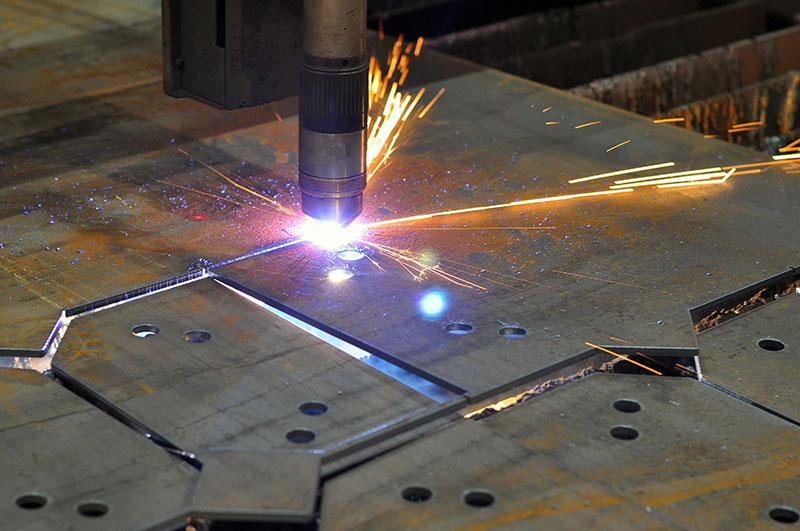 Acumen Machine uses plasma machine to cut through steel sheets