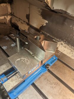 Acumen machining a shaped part