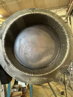Acumen welding top of drum aerial view